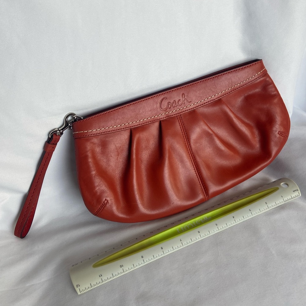Tomato colored Coach Clutch